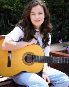Elise Private Student Learning Fingestyle Guitar